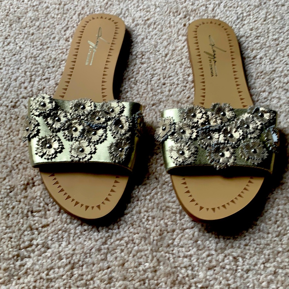 Gold sandals with flowers